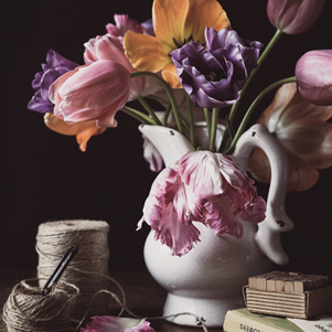 Bouquet of tulips and books