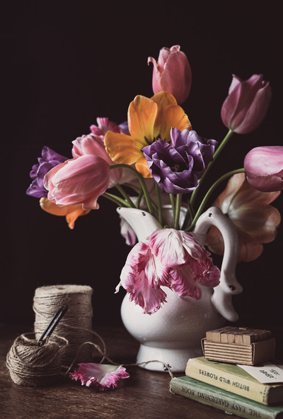 Bouquet of tulips and books