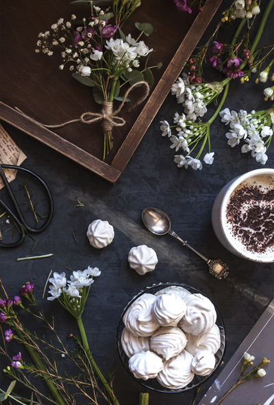Flowers, coffee and marshmallow cookies