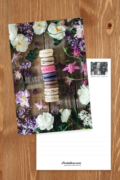 Colorful macaroons and flowers
