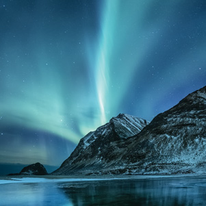 Landscape with mountains and aurora