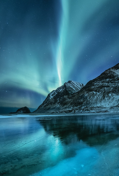 Landscape with mountains and aurora