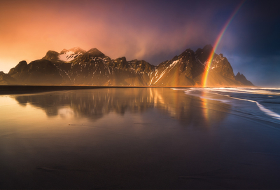 Stokness beach with a rainbow
