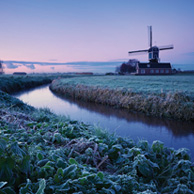 Winter landscape with a windmill