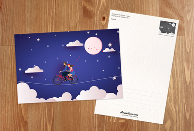 Couple on a bicycle at night