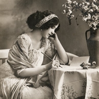 A lady writing a letter
