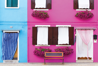Pink and blue house facades