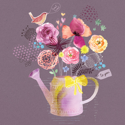 Watering can with flowers