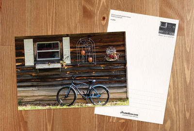 Bicycle and old wooden house