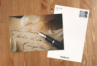 Old postcards and a pen