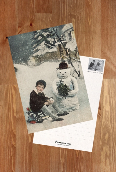 Boy with a snowman