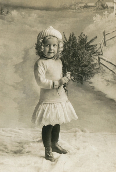 Girl with a christmas tree