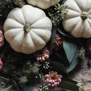 White pumpkins and flowers
