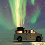 Van under the aurora borealis